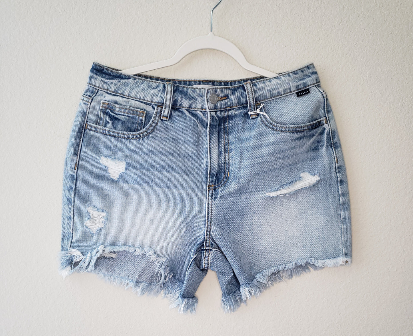 High Rise Uneven Hem Shorts