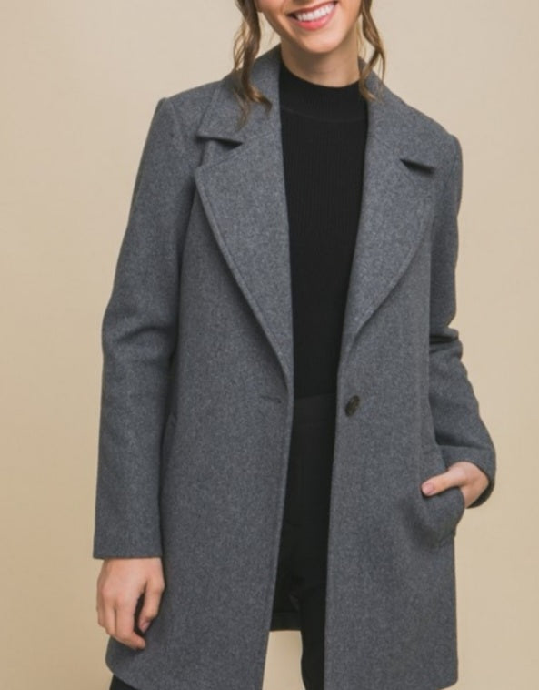 Manteau gris en polaire à simple boutonnage