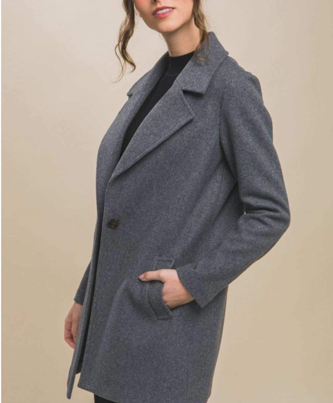 Manteau gris en polaire à simple boutonnage